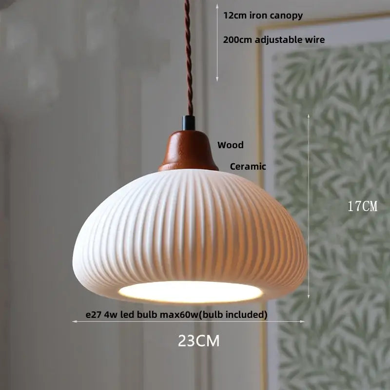 Scalloped white ceramic led pendant lamp with wooden top and iron canopy for dining room decorbites ceramic led pendant