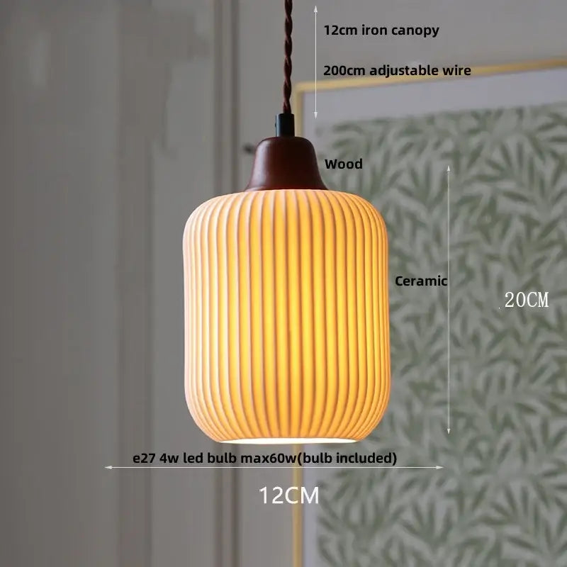Warm-toned scalloped white ceramic led pendant lamp with vertical ridges, wooden canopy, and iron wire suspension by decorbites ceramic led