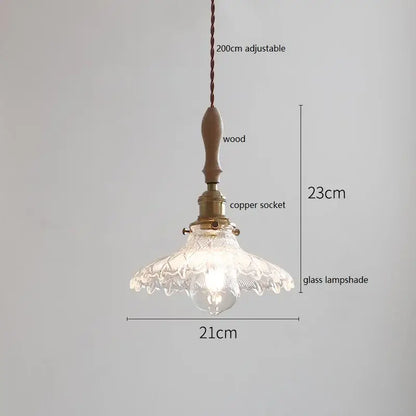 Delicate scalloped white ceramic led pendant light with clear etched glass shade suspended by copper chain for bedroom decor
