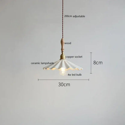 Scalloped white ceramic led pendant light with fluted design suspended by wooden handle and copper socket for bedroom decorbites ceramic led pendant