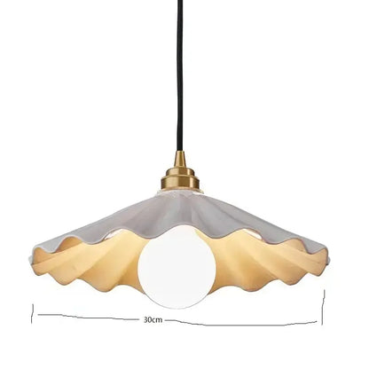 Scalloped white ceramic led pendant light with a translucent gray and amber glass shade for dining room decorbites ceramic led pendant lights