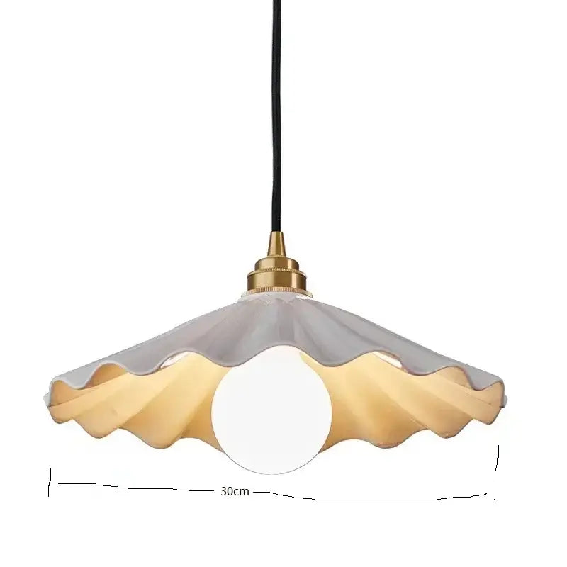 Scalloped white ceramic led pendant light with a translucent gray and amber glass shade for dining room decorbites ceramic led pendant lights