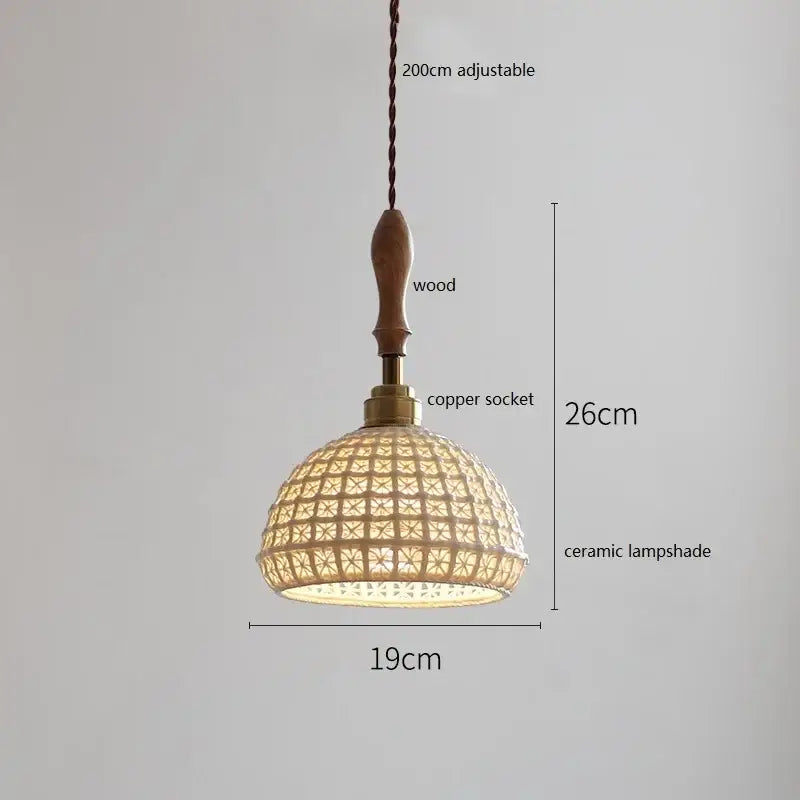A warm-toned scalloped white ceramic led pendant light with woven lattice pattern and copper socket for dining room decorbites ceramic led