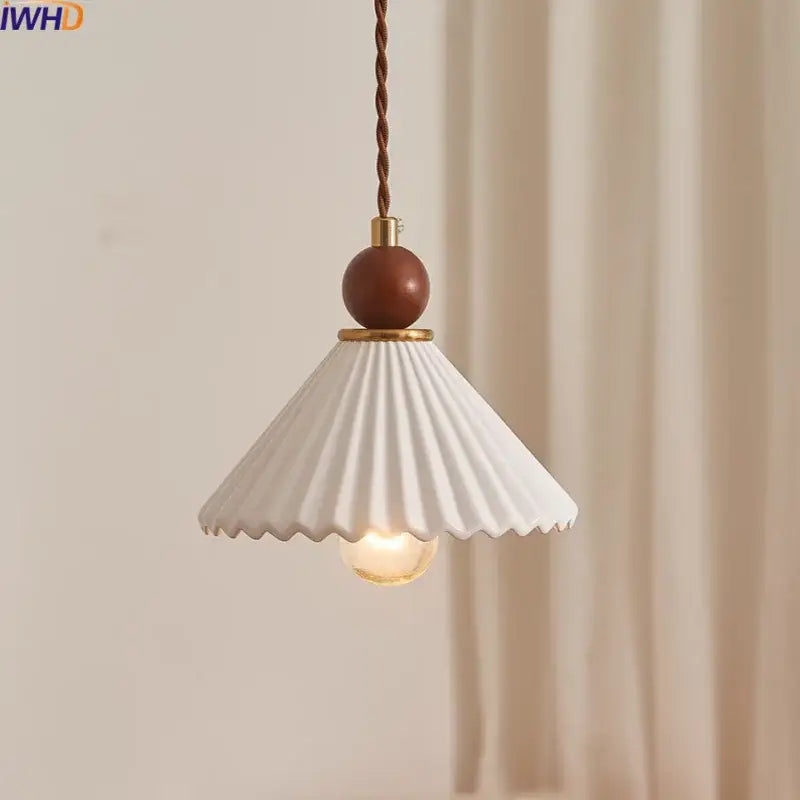 Scalloped white ceramic wood pendant lamp with fluted shade and brown wooden sphere accent for dining room decorbites ceramic wood led