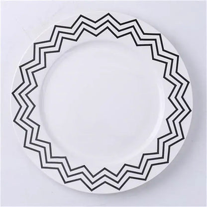 White ceramic dessert plate with bold black zigzag rim pattern from decorbites ceramic dessert plates collection