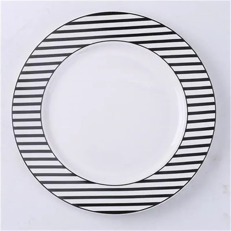 Scandinavian black and white geometric ceramic dessert plate with bold striped border from decorbites ceramic dessert collection
