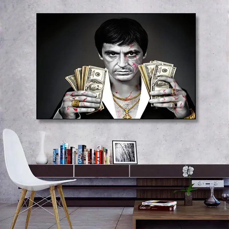 Black-and-white tony montana canvas wall art print by decorbites featuring man in white shirt and black suit holding u.s. stacks