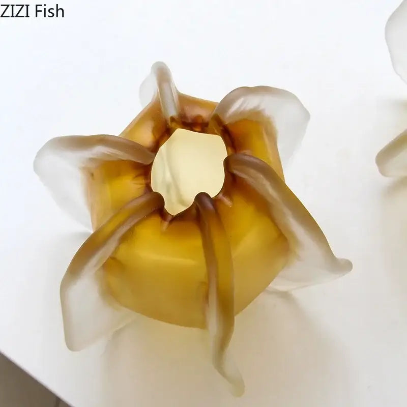 Translucent amber glass vase in a flower shape with delicate petal arms for living room decorbites carambola glass decor