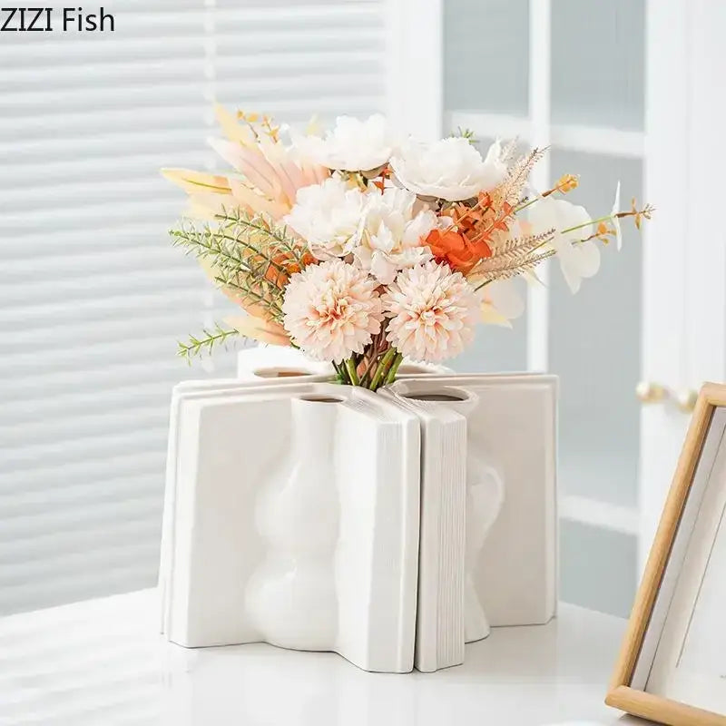 White ceramic vase shaped like an open book with textured wavy design for creative flowers desk decoration decorbites