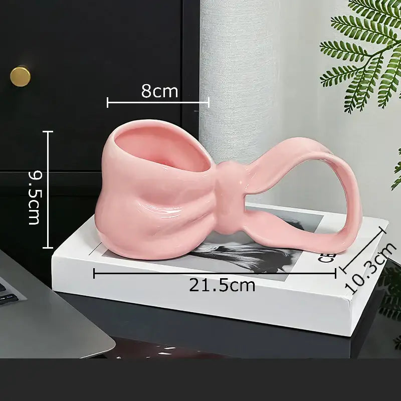 Glossy pink decorbites bowknot ceramic coffee mug shaped like a bowknot for kitchen tea and coffee use
