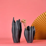 Black texture ceramic vase with sculpted petal shapes and matte finish for living room decor by decorbites black texture