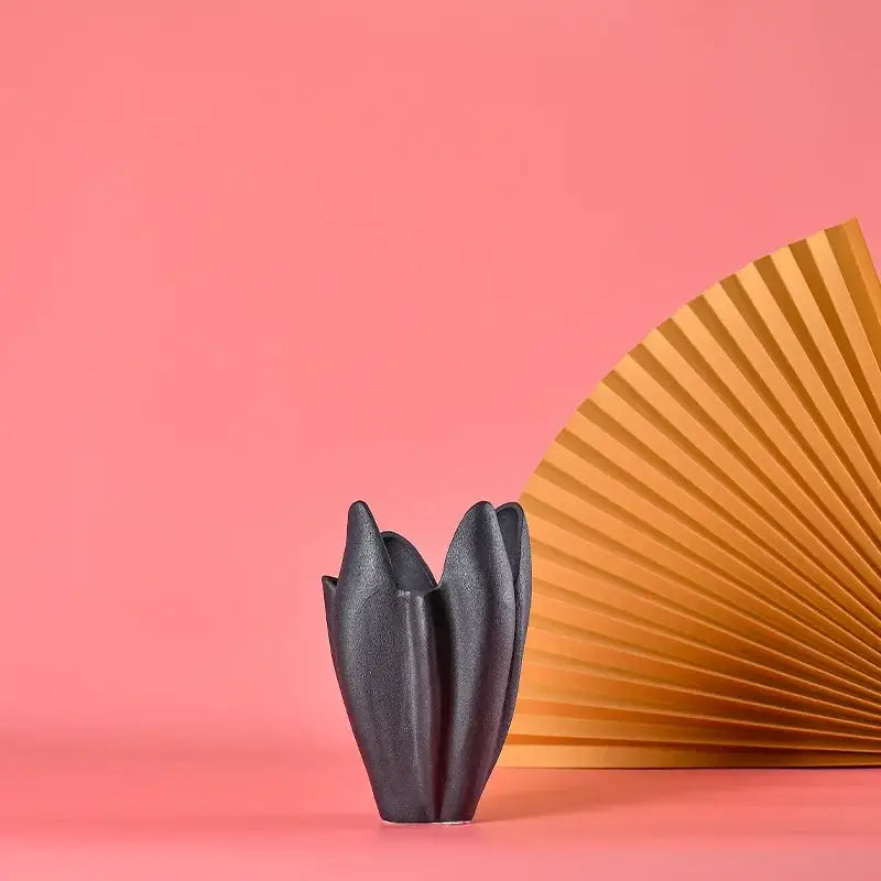 Black texture ceramic vase with sculpted petal form for living room decor by decorbites black texture series