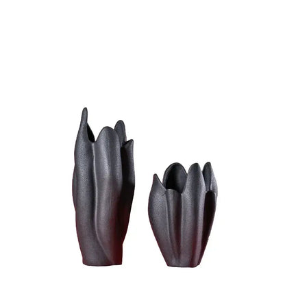 Two matte black texture ceramic vases with sculpted petal design ideal for modern living room decorbites decor
