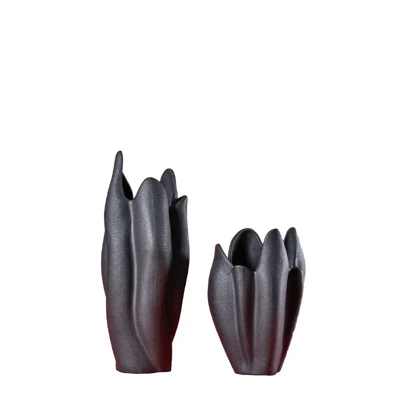 Two matte black texture ceramic vases with sculpted petal design ideal for modern living room decorbites decor