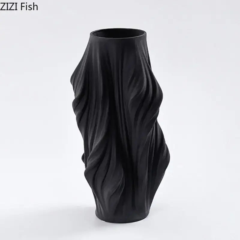 Black ceramic vase with sculpted flowing ribbed texture for bedroom decorbites ceramic vase collection