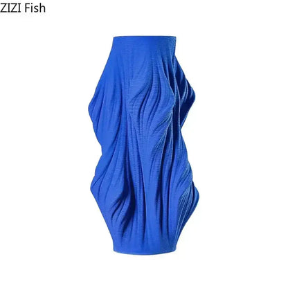 Vibrant cobalt blue textured knit midi skirt with sculpted draped silhouette featured with decorbites ceramic vase set for bedroom decor