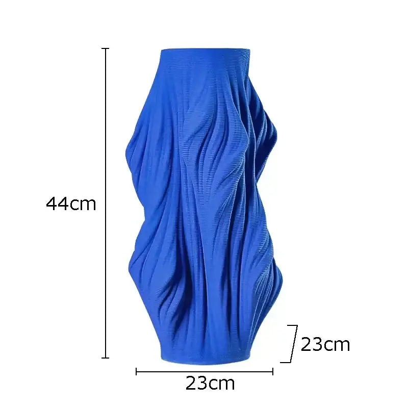 Vibrant blue decorbites ceramic vase with sculpted flowing ribbed texture for bedroom decor centerpiece