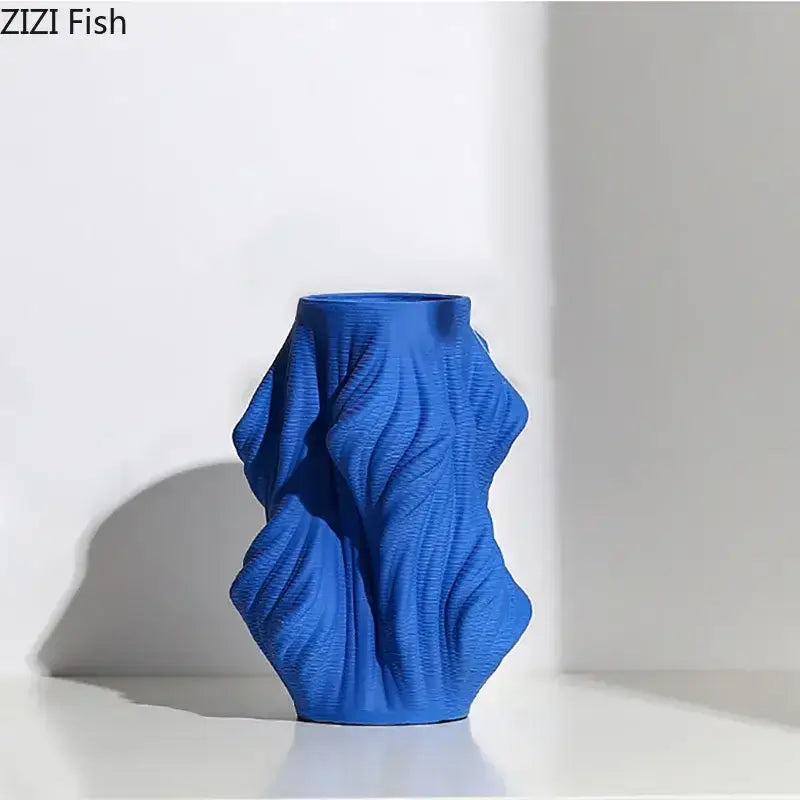 Sculpted white ceramic vase set with vibrant blue decorbites ceramic vase featuring flowing ridges for bedroom decor