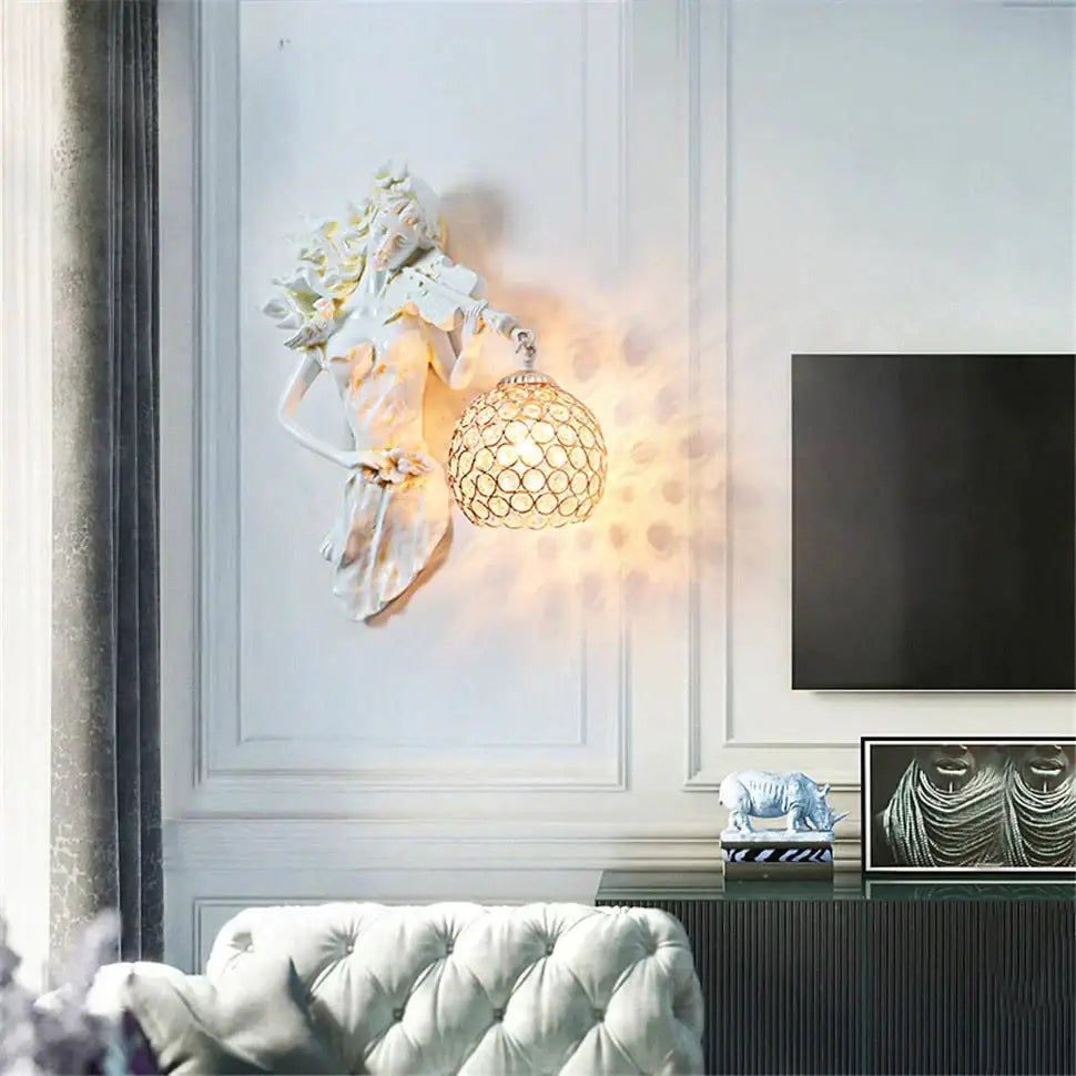 White sculptural gold violinist crystal wall lamp with ornate spherical shade for elegant living room lighting