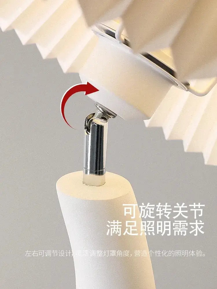 Sculptural cream resin floor lamp with white pleated lampshade and chrome adjustable joint for living room decorbites lighting
