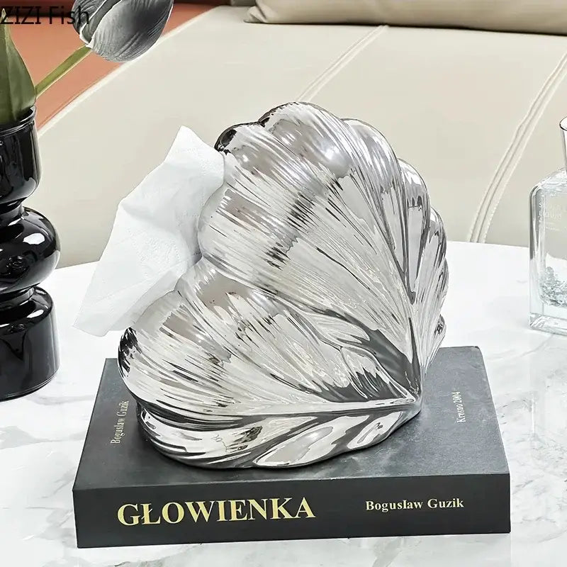 Shiny silver shell-shaped tissue box holder made of heart feather ceramic for bedroom decor by decorbites heart feather