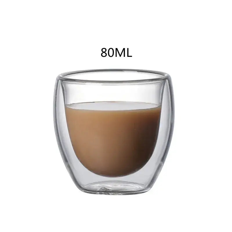 Clear double wall glass cup holding 80ml brown liquid part of set of 3 glass cup tumblers for kitchen and dining