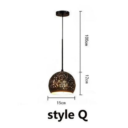 Set of 4 black and gold etched iron pendant light fixtures with sleek black pendant light and speckled glass shade