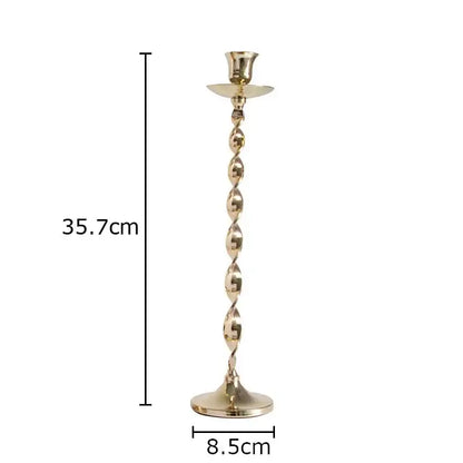 A 35.7cm brass decorbites golden candlestick holder with twisted spiral stem and flared base for dining room decor