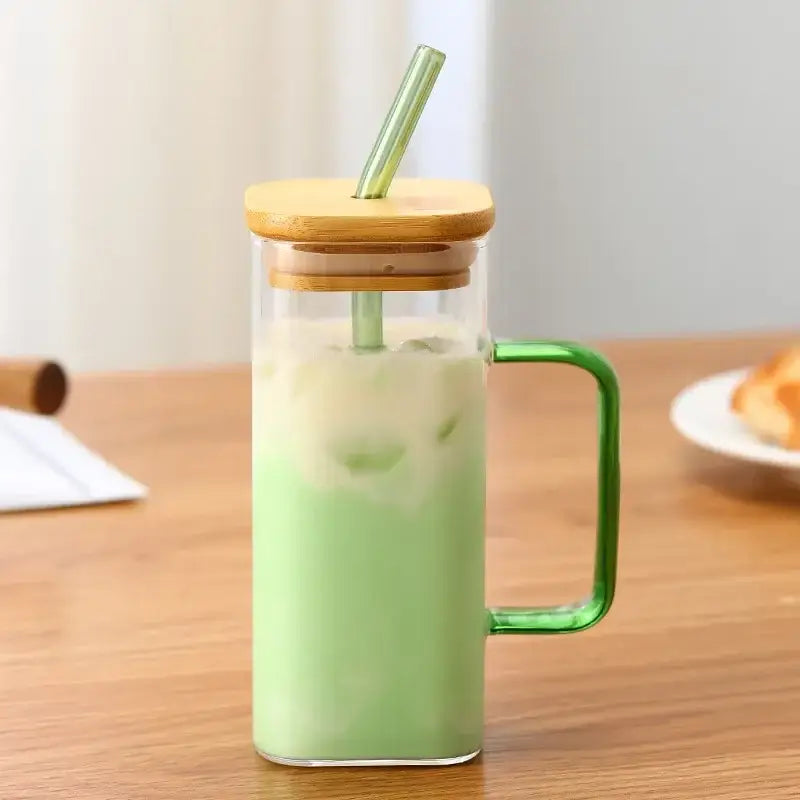 Set of 5 square glass mugs with colored handle layer green handle and bamboo lid filled with iced mint tea