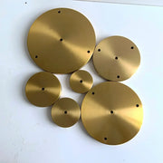 Set of six brass ceiling plate lamp bases with brushed finish and evenly spaced holes for kitchen diy use