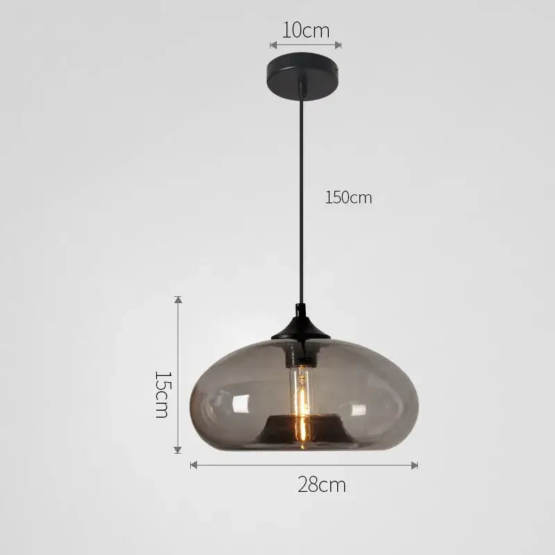 A sleek modern pendant light with smoked glass globe and black metal hardware from decorbites colorful glass pendant set