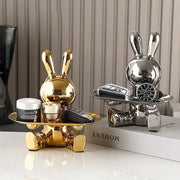 Shiny gold and silver ceramic colorful rabbit storage box with reflective surface holding trays by decorbites