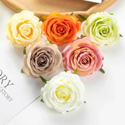 A collection of silk blue artificial flowers and roses in pastel and vibrant hues made from smooth lifelike fabric for decor