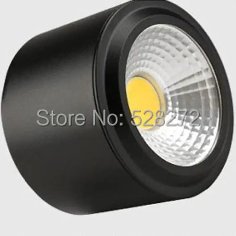 Black cylindrical 15w cob led downlight with textured lens and visible yellow led for exhibition lighting