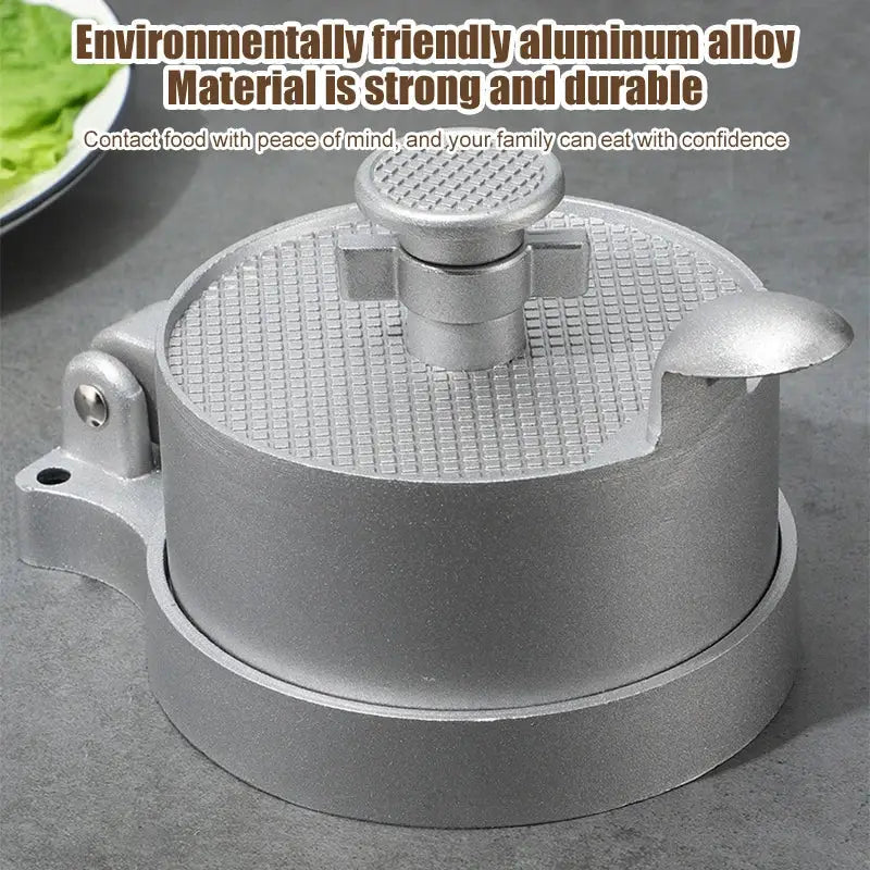 Silver aluminum meat press tool hamburger press with textured grid pattern and central pressure adjustment knob