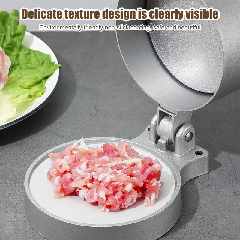 Silver aluminum meat press tool with non-stick coated interior and textured design for hamburger press use