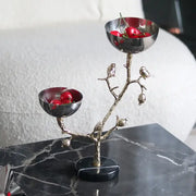 Silver-toned metal snack bowl fruit stand shaped like a tree with two bowls and gold bird figurines for dining room use