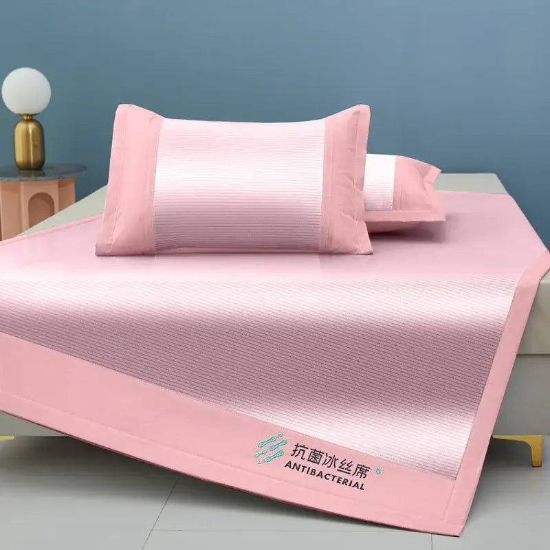 Pink antibacterial cooling sheet with striped texture and matching pillowcases from decorbites cooling sheet collection