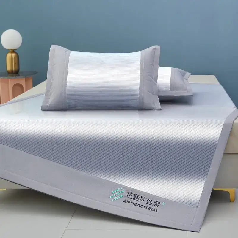 Light gray antibacterial cooling sheet with subtle stripes and embroidered decorbites cooling branding in ice silk material