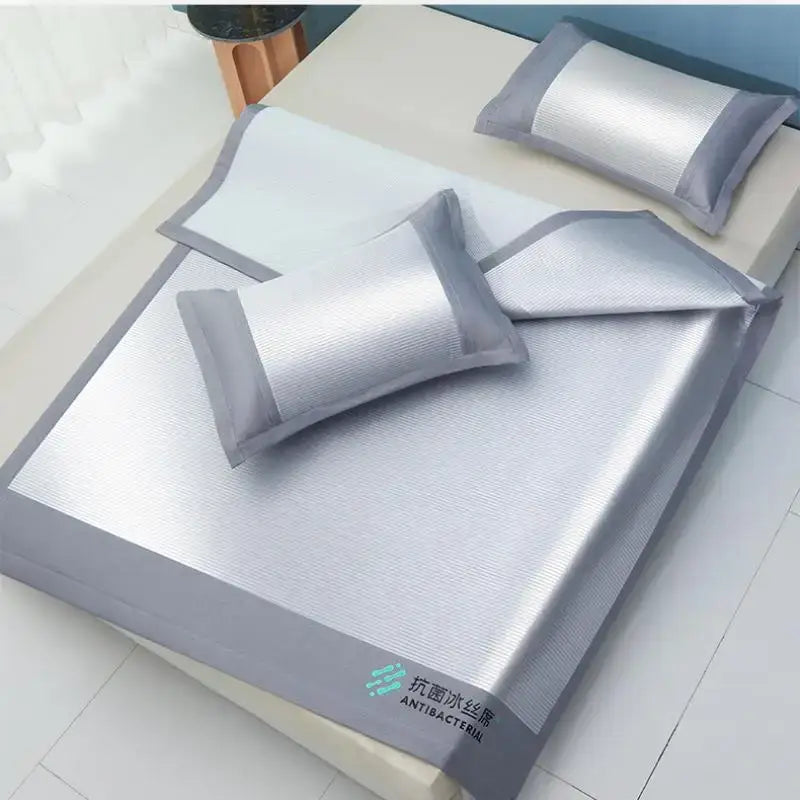 Silver and gray antibacterial cooling sheet with a textured ribbed surface made of ice silk by decorbites cooling sheet