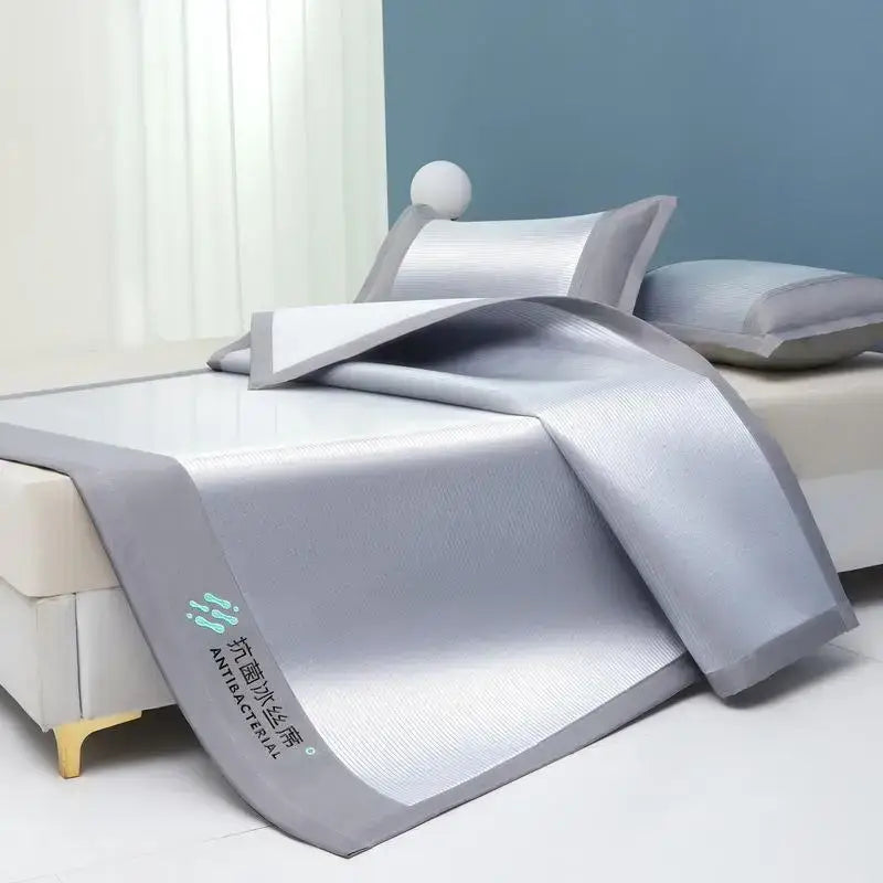 Silver antibacterial cooling sheet with textured woven surface and gray border trim by decorbites cooling sheet