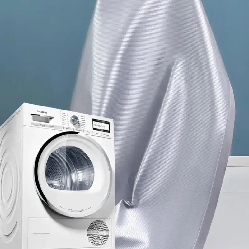 White siemens front-loading dryer with digital display shown with silver and gray antibacterial decorbites cooling sheet