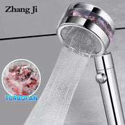 Silver chrome-finished zhang ji double panel turbo shower head with translucent purple band and multiple water jets flowing