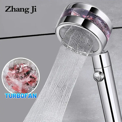 Silver chrome-finished zhang ji double panel turbo shower head with translucent purple band and multiple water jets flowing