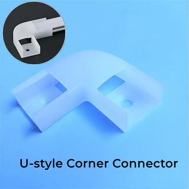 White u-style corner connector with translucent finish and cutouts for secure cable management in aluminum profile recessed led strip channel