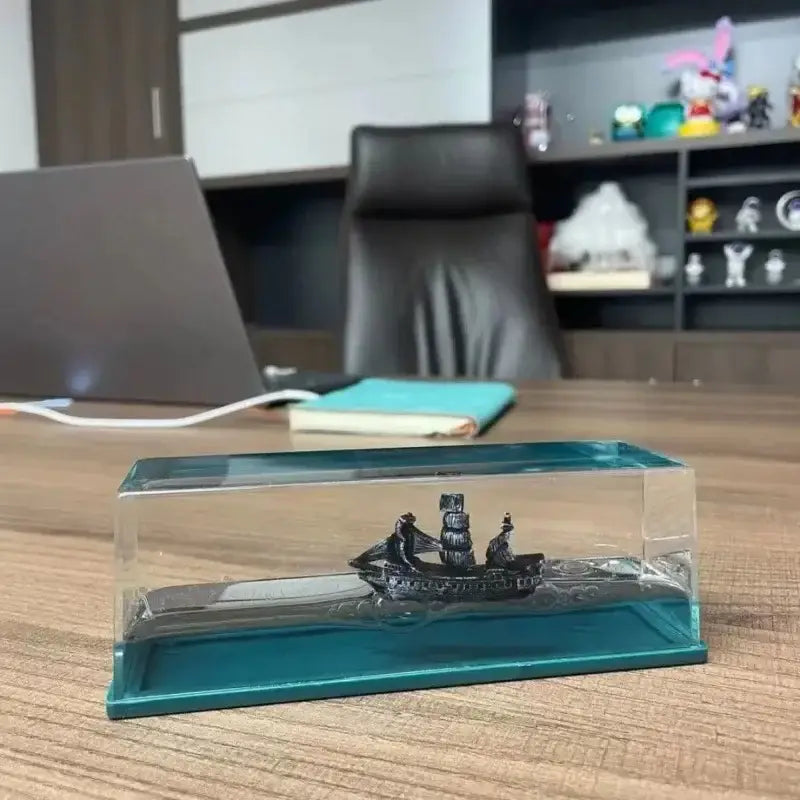 Silver black pearl pirate ship black miniature model encased in transparent resin display with teal base office decorbites black pearl