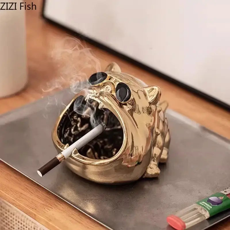 Silver bulldog ceramic ashtray shaped like a golden tiger with black gemstone eyes and a cigarette in its mouth for desktop use