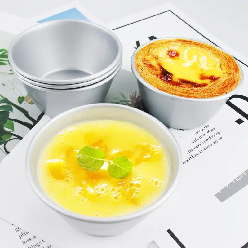 Silver carbon steel cake mold set featuring a smooth reflective aluminum mini muffin tin with rounded edges by decorbites carbon steel