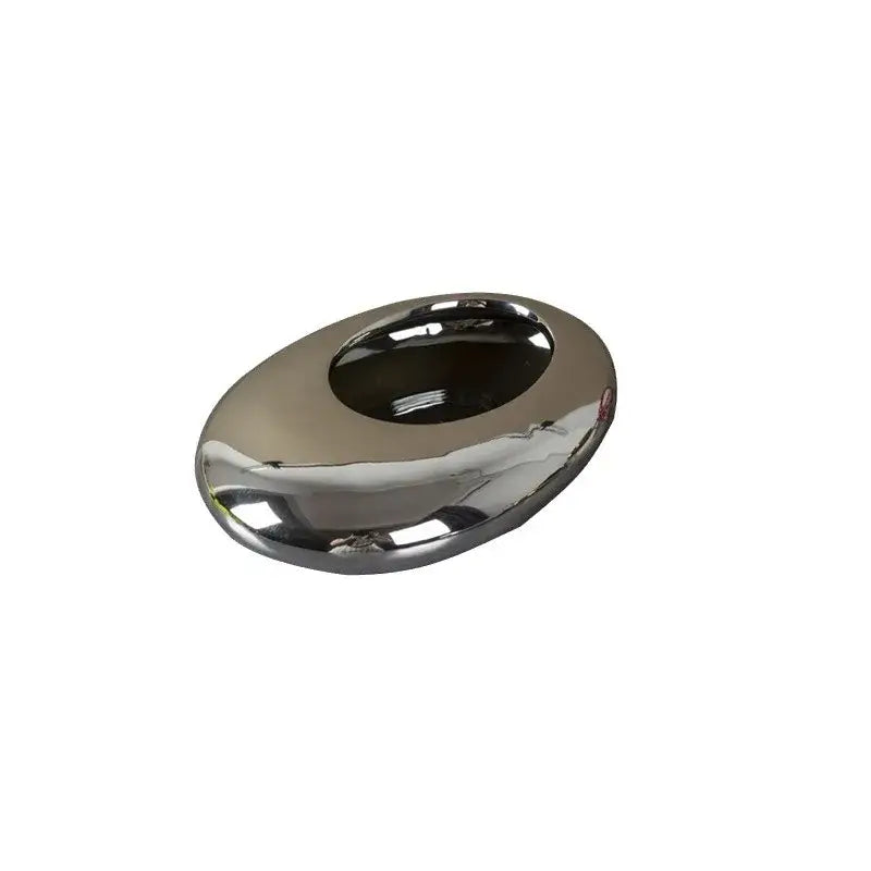 Shiny chrome oval ashtray with a smooth reflective surface in decorbites silver cobblestone ceramic vase gold and silver oval bowl set