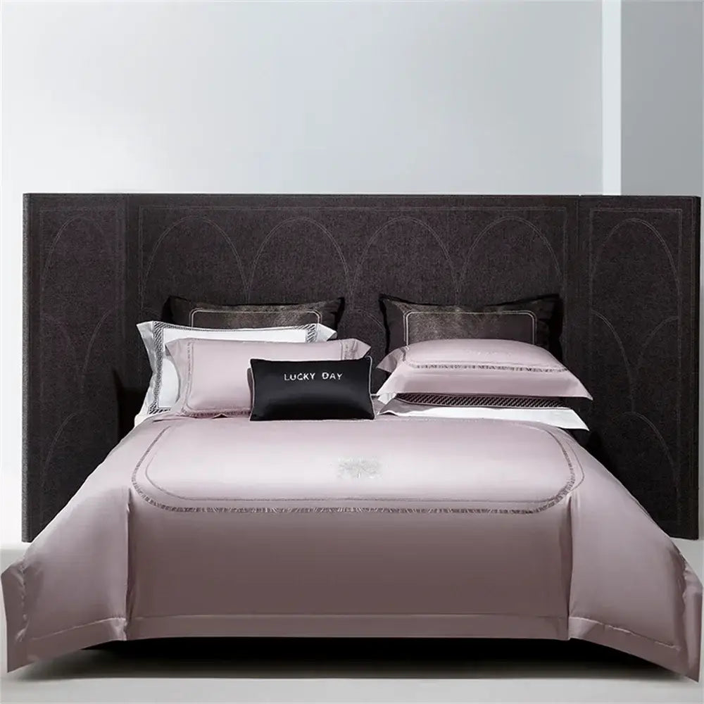 A soft lavender cotton satin jacquard bedding set with silver-threaded trim and subtle embroidery for bedroom decorbites